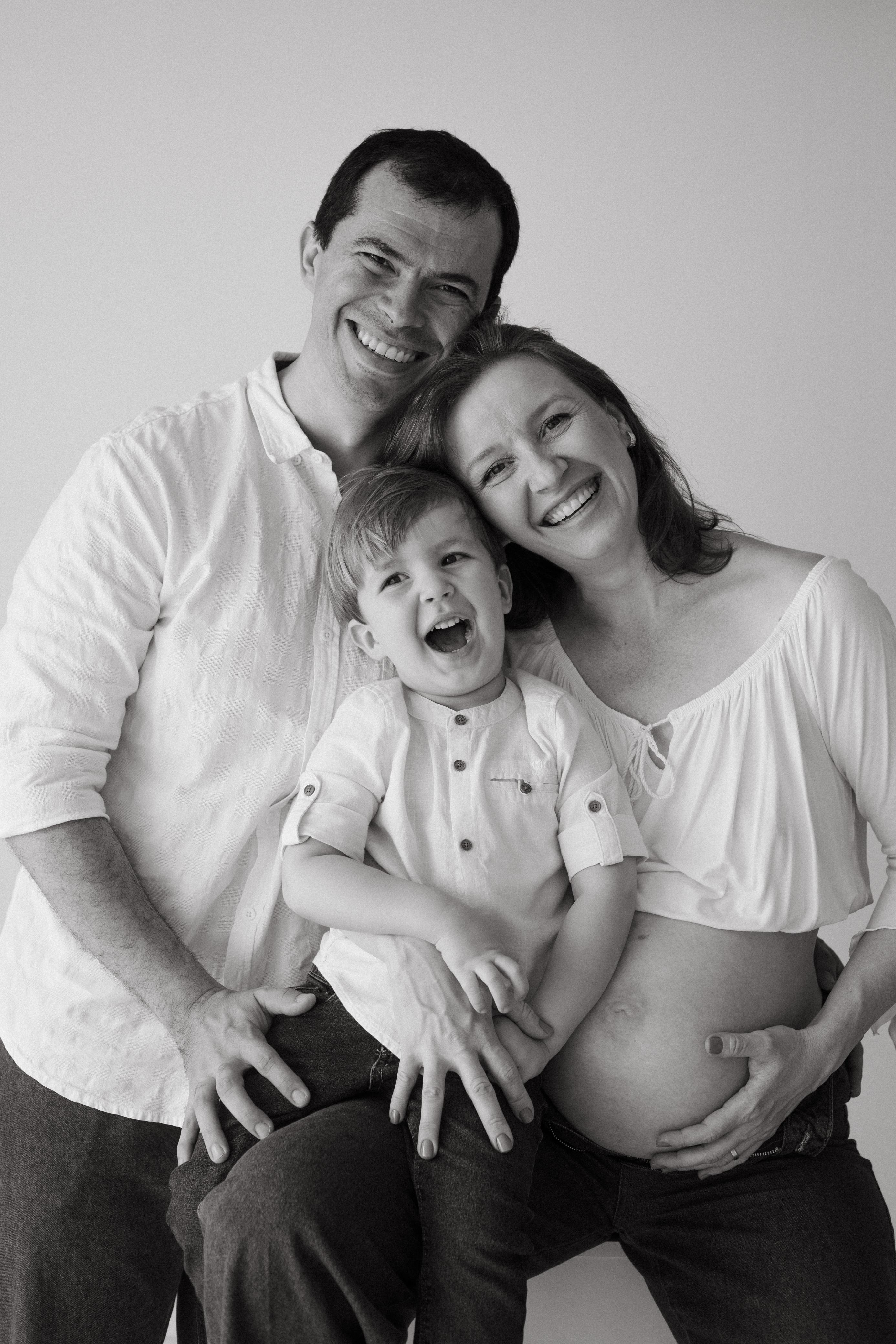 Família no ensaio de gestante